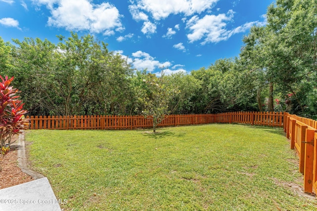 2100 Weatherly Ave, Melbourne, FL 32904 - view of yard featuring a fenced backyard