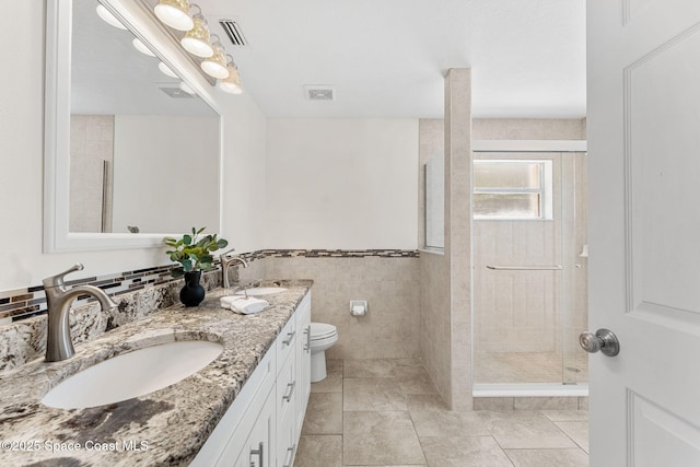 2100 Weatherly Ave, Melbourne, FL 32904 - full bath featuring a sink, a shower stall, and visible vents