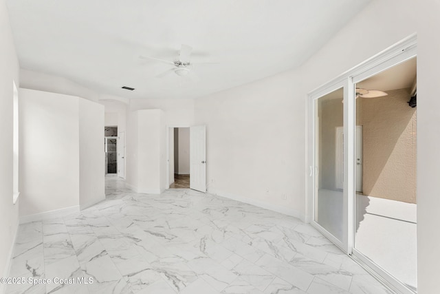 2100 Weatherly Ave, Melbourne, FL 32904 - unfurnished bedroom featuring baseboards, visible vents, a ceiling fan, and marble finish floor