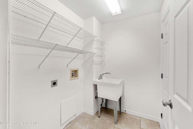 2100 Weatherly Ave, Melbourne, FL 32904 - laundry area featuring washer hookup, hookup for an electric dryer, laundry area, and baseboards