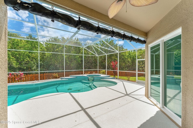 2100 Weatherly Ave, Melbourne, FL 32904 - view of pool featuring a ceiling fan, a pool with connected hot tub, a fenced backyard, a patio area, and glass enclosure