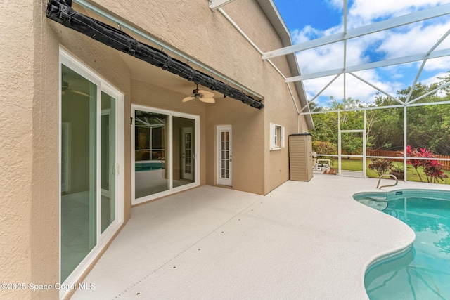 2100 Weatherly Ave, Melbourne, FL 32904 - outdoor pool featuring a ceiling fan, a lanai, and a patio area
