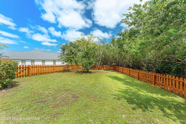 2100 Weatherly Ave, Melbourne, FL 32904 - view of yard featuring a fenced backyard