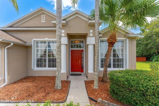 2100 Weatherly Ave, Melbourne, FL 32904 - property entrance featuring stucco siding