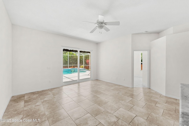 2100 Weatherly Ave, Melbourne, FL 32904 - spare room with baseboards and a ceiling fan