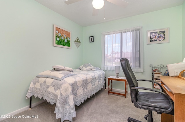 bedroom with baseboards, ceiling fan, and carpet flooring