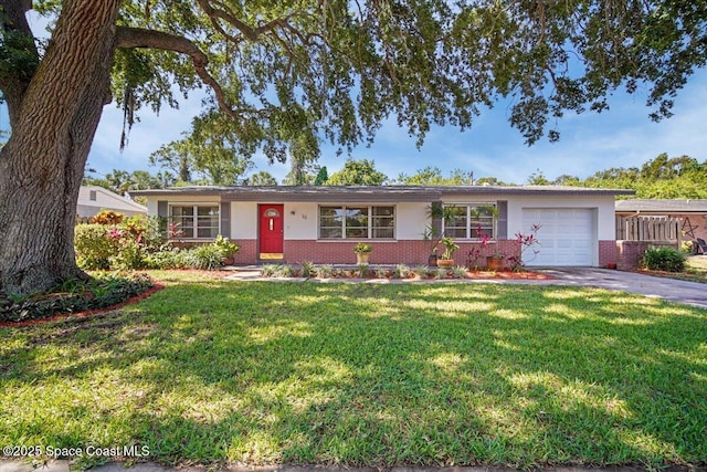 15 Skyline Blvd, Merritt Island, FL 32953 - ranch-style home with brick siding, driveway, an attached garage, and stucco siding