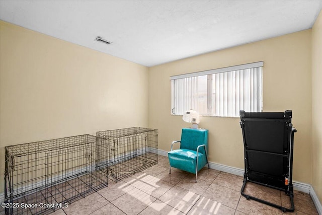 15 Skyline Blvd, Merritt Island, FL 32953 - sitting room with baseboards and tile patterned flooring
