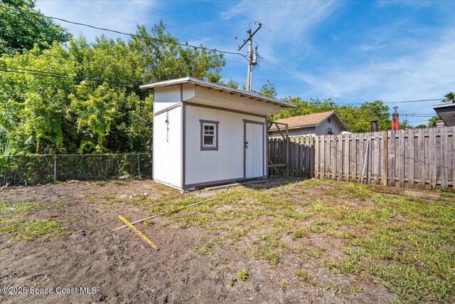 15 Skyline Blvd, Merritt Island, FL 32953 - view of shed with a fenced backyard