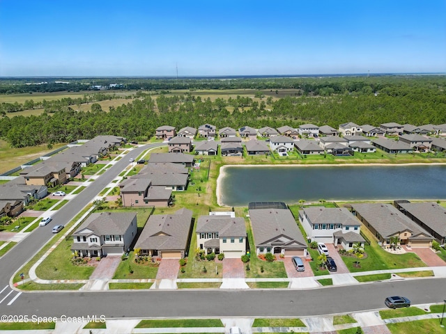 bird's eye view featuring a water view and a residential view
