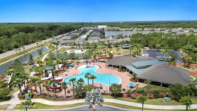 aerial view with a water view and a residential view