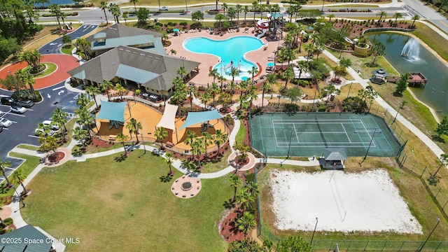 birds eye view of property featuring a water view