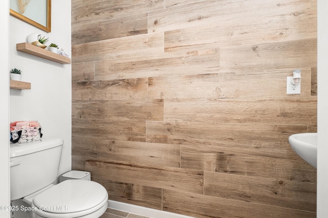 bathroom featuring toilet