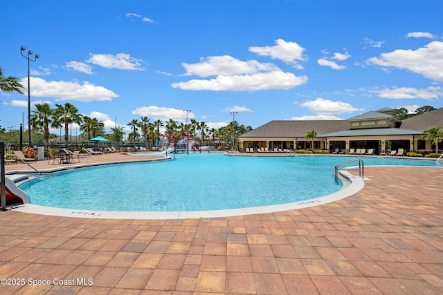 pool with a patio