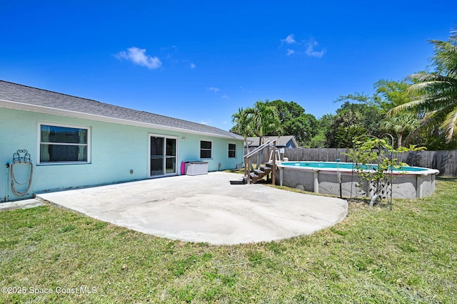 view of yard featuring a fenced in pool and a fenced backyard