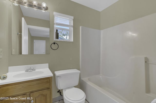 full bath with toilet and vanity