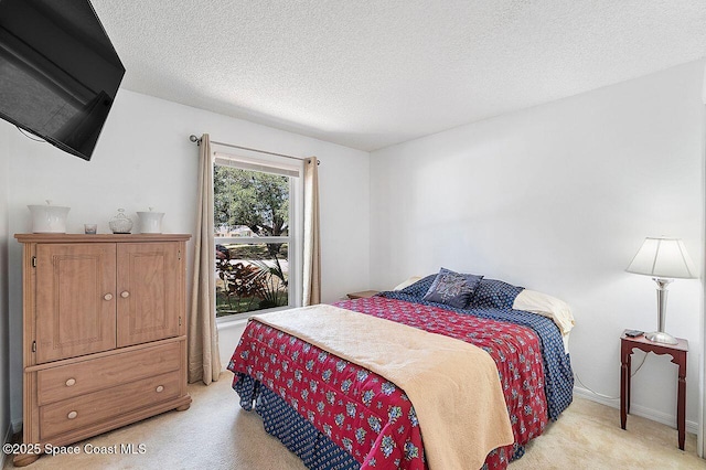 1500 Gardenton St NW Unit 44, Palm Bay, FL 32907 - bedroom with light carpet and a textured ceiling
