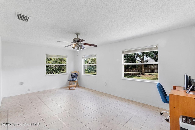 1500 Gardenton St NW Unit 44, Palm Bay, FL 32907 - unfurnished office with ceiling fan, a textured ceiling, and light tile patterned floors