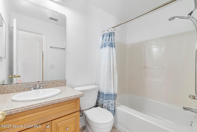 1500 Gardenton St NW Unit 44, Palm Bay, FL 32907 - bathroom featuring toilet, shower / bath combo with shower curtain, and vanity