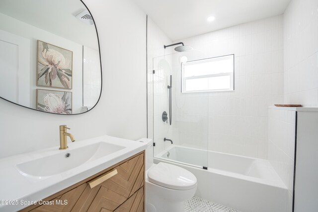 full bathroom with shower / bathtub combination, toilet, visible vents, and vanity