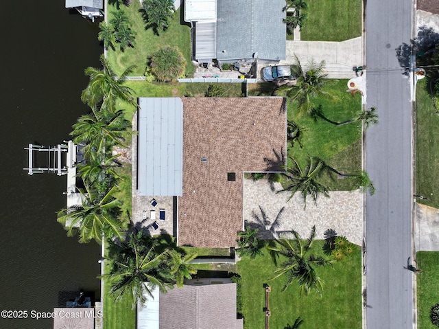 drone / aerial view with a water view