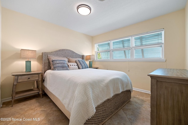 bedroom with baseboards