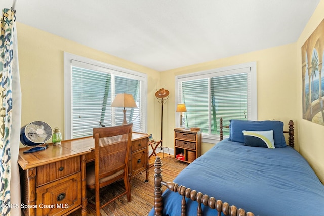 bedroom featuring wood finished floors