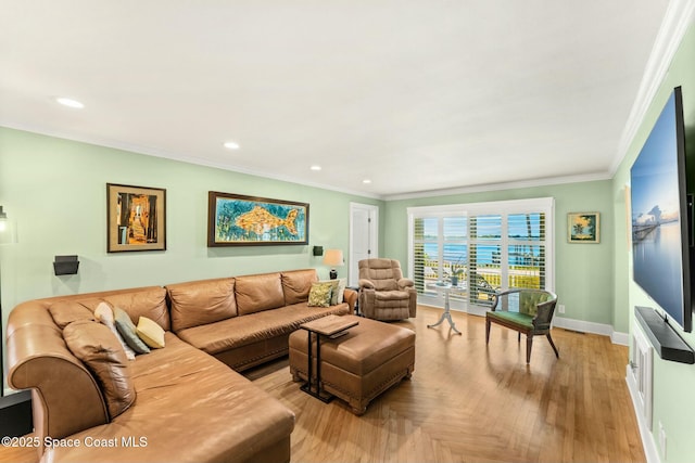 living area with crown molding, recessed lighting, and baseboards