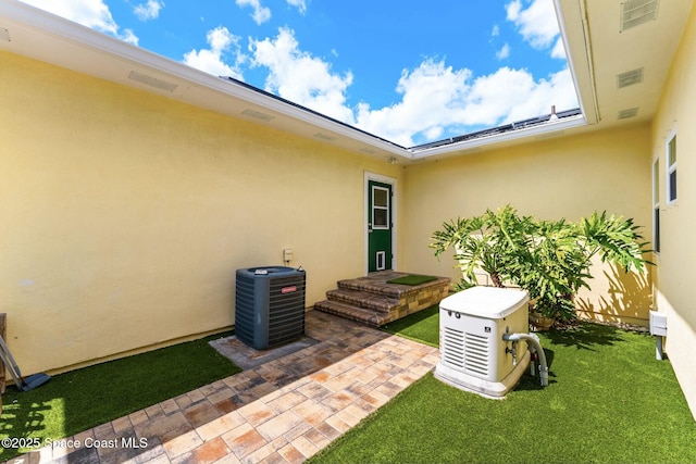 view of patio / terrace with central AC