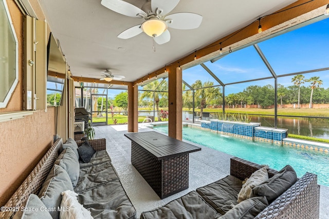 view of patio / terrace with an outdoor pool, an outdoor living space, a ceiling fan, a water view, and a lanai