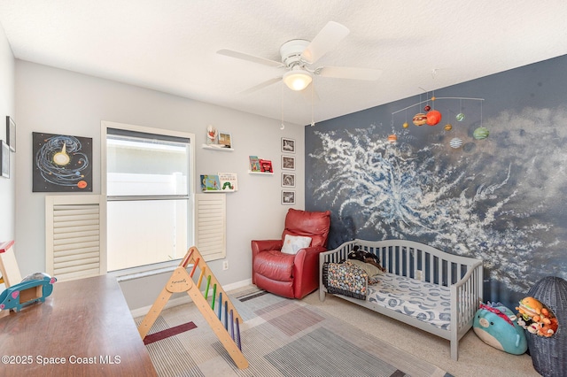 bedroom featuring ceiling fan and wood finished floors