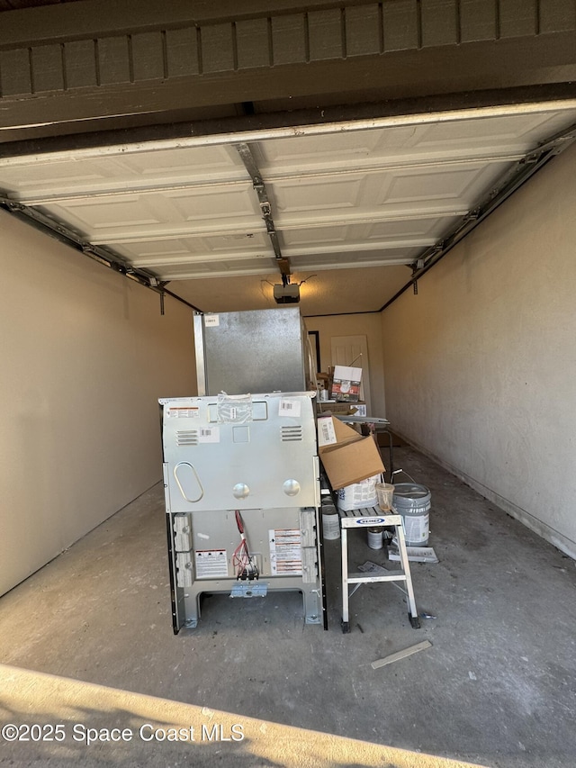 garage featuring a garage door opener