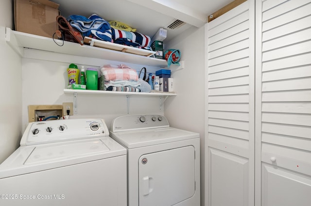 100 Canebreakers Dr Unit 112, Cocoa, FL 32927 - washroom with laundry area and separate washer and dryer