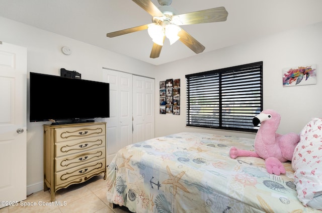100 Canebreakers Dr Unit 112, Cocoa, FL 32927 - bedroom featuring light tile patterned floors, ceiling fan, and a closet