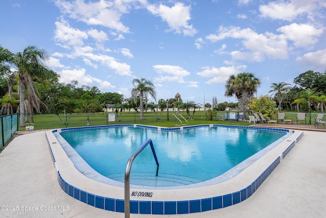 100 Canebreakers Dr Unit 112, Cocoa, FL 32927 - pool with a lawn and fence