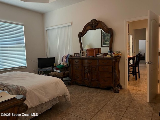 bedroom featuring tile patterned floors