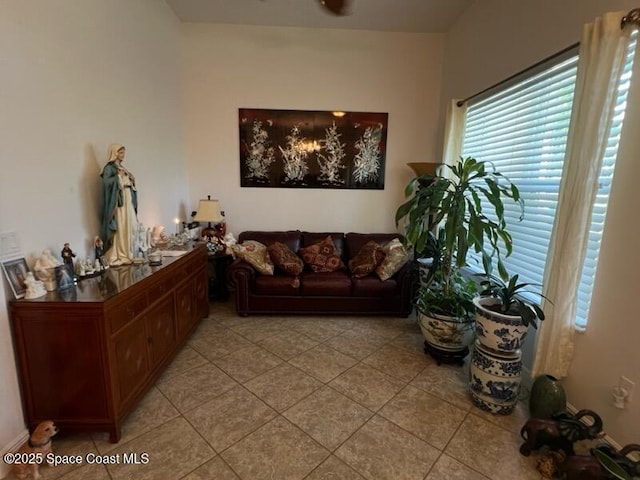 living area with light tile patterned flooring