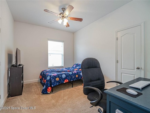carpeted bedroom with baseboards and ceiling fan
