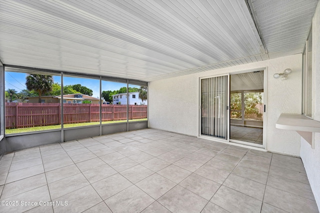 view of unfurnished sunroom