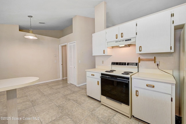 kitchen with light countertops, pendant lighting, under cabinet range hood, and electric range