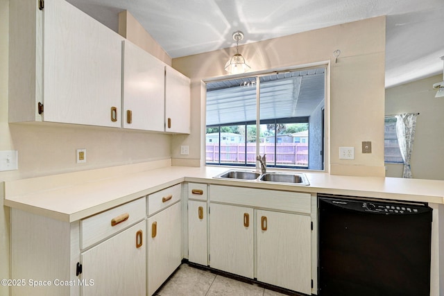 kitchen featuring a sink, light countertops, and dishwasher