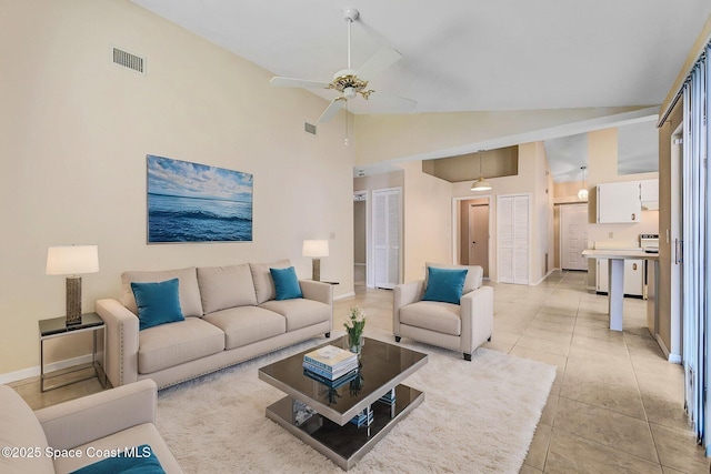 living room with baseboards, ceiling fan, and visible vents