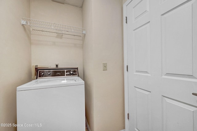washroom featuring laundry area and washer / clothes dryer