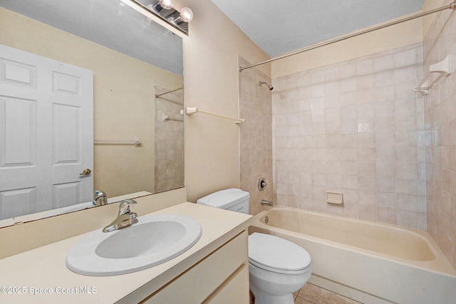 bathroom with toilet,  shower combination, and vanity