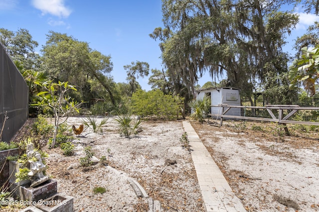 view of yard with fence