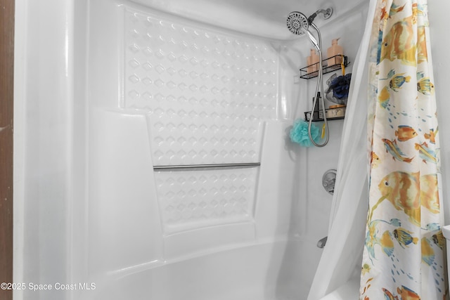 full bathroom with shower / bath combination with curtain