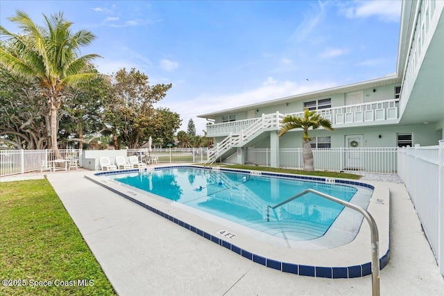 299 E Central Blvd Unit 6, Cape Canaveral, FL 32920 - pool with a patio, fence, and stairs