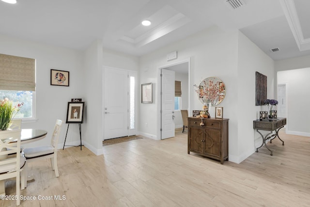 1401 Wyoming Dr SE, Palm Bay, FL 32909 - foyer with baseboards, visible vents, and light wood-style floors