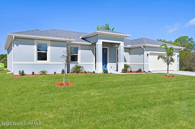 1401 Wyoming Dr SE, Palm Bay, FL 32909 - prairie-style home featuring a garage, stucco siding, concrete driveway, and a front lawn