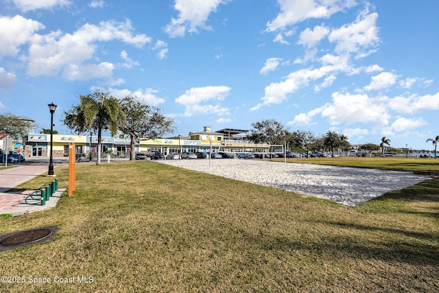 1236 Mycroft Dr, Cocoa, FL 32926 - surrounding community featuring a lawn and volleyball court